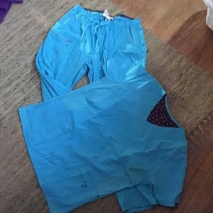 Women’s Koi L scrubs turquoise. You’ll love going to work in this beautiful set!